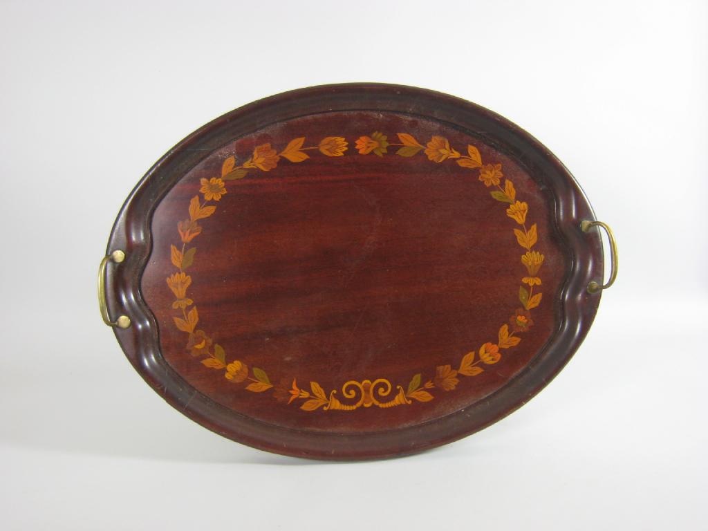 Appraisal: An Edwardian mahogany oval two handled Tea Tray inlaid with