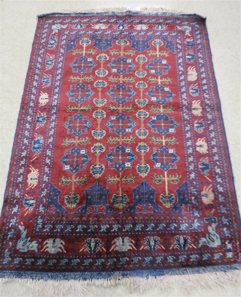 Appraisal: HAND KNOTTED ORIENTAL AREA RUG Afghan Bokhara design on red