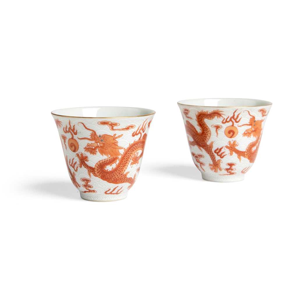 Appraisal: PAIR OF IRON-RED-DECORATED 'DRAGON' CUPS QIANLONG MARK BUT TH- TH