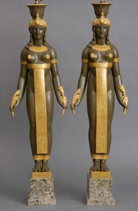 Appraisal: PAIR OF EMPIRE-STYLE PAINTED AND PARCEL-GILT CAST PLASTER FEMALE FIGURES