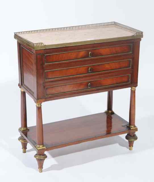 Appraisal: A FRENCH EMPIRE SIDE TABLE with marble top pierced gilt