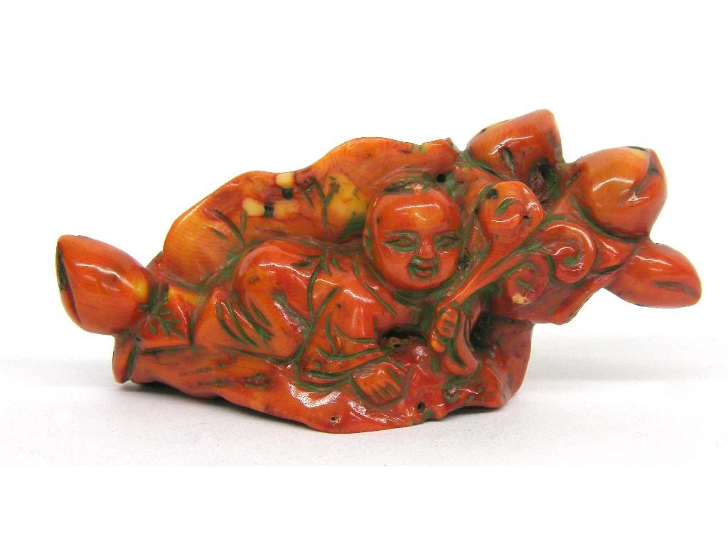 Appraisal: Interesting Oriental coral carving modelled as a young boy crawling