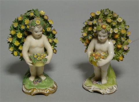 Appraisal: PAIR OF SAMSON 'CHELSEA' PUTTI FIGURINES th century with apocryphal