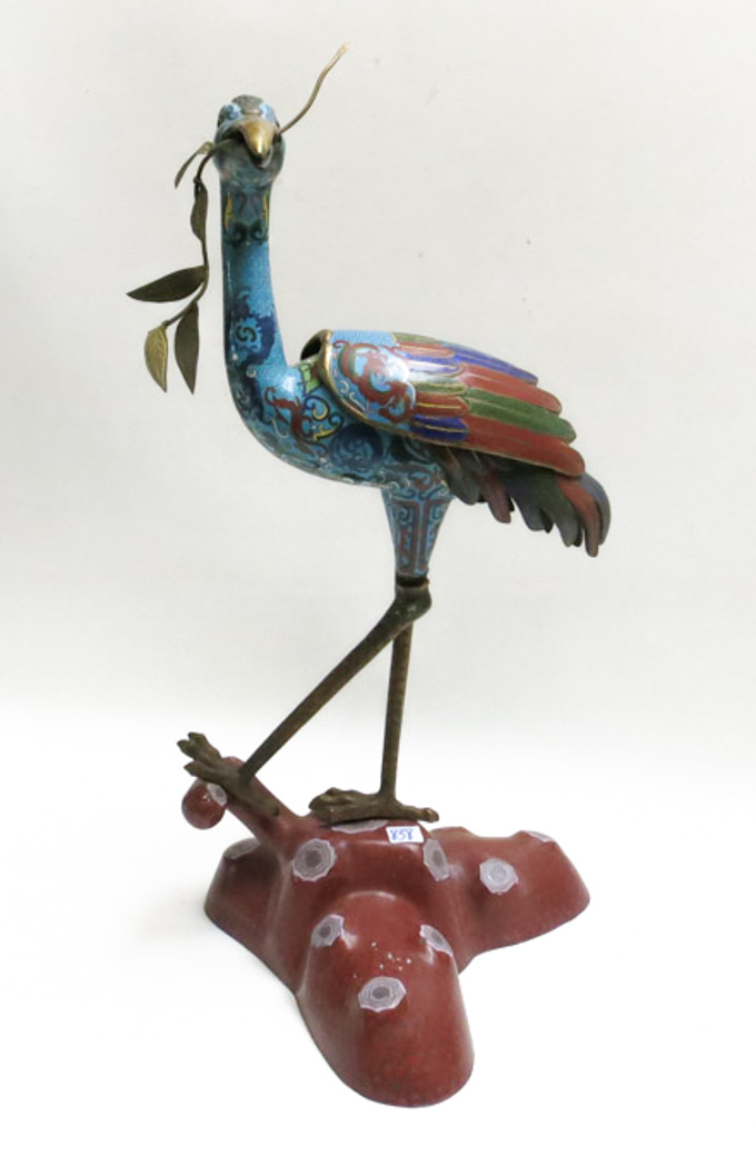 Appraisal: CHINESE CLOISONNE STANDING CRANE SCULPTURE holding a metal branch with