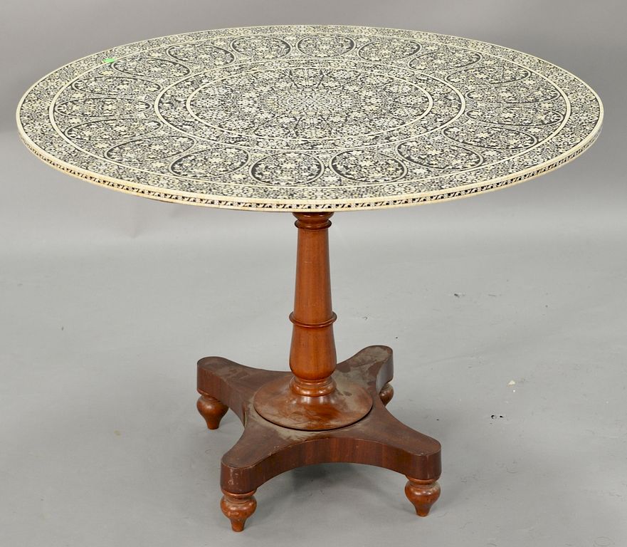 Appraisal: Eastern tip top table having bone and ebony inlaid round