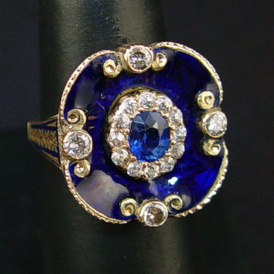 Appraisal: DIAMOND SAPPHIRE AND ENAMEL RING K yellow gold and enameled