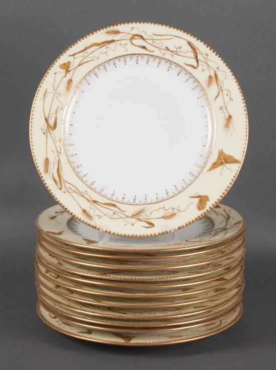 Appraisal: Set of French probably Limoges gilt-decorated porcelain plates dated cream