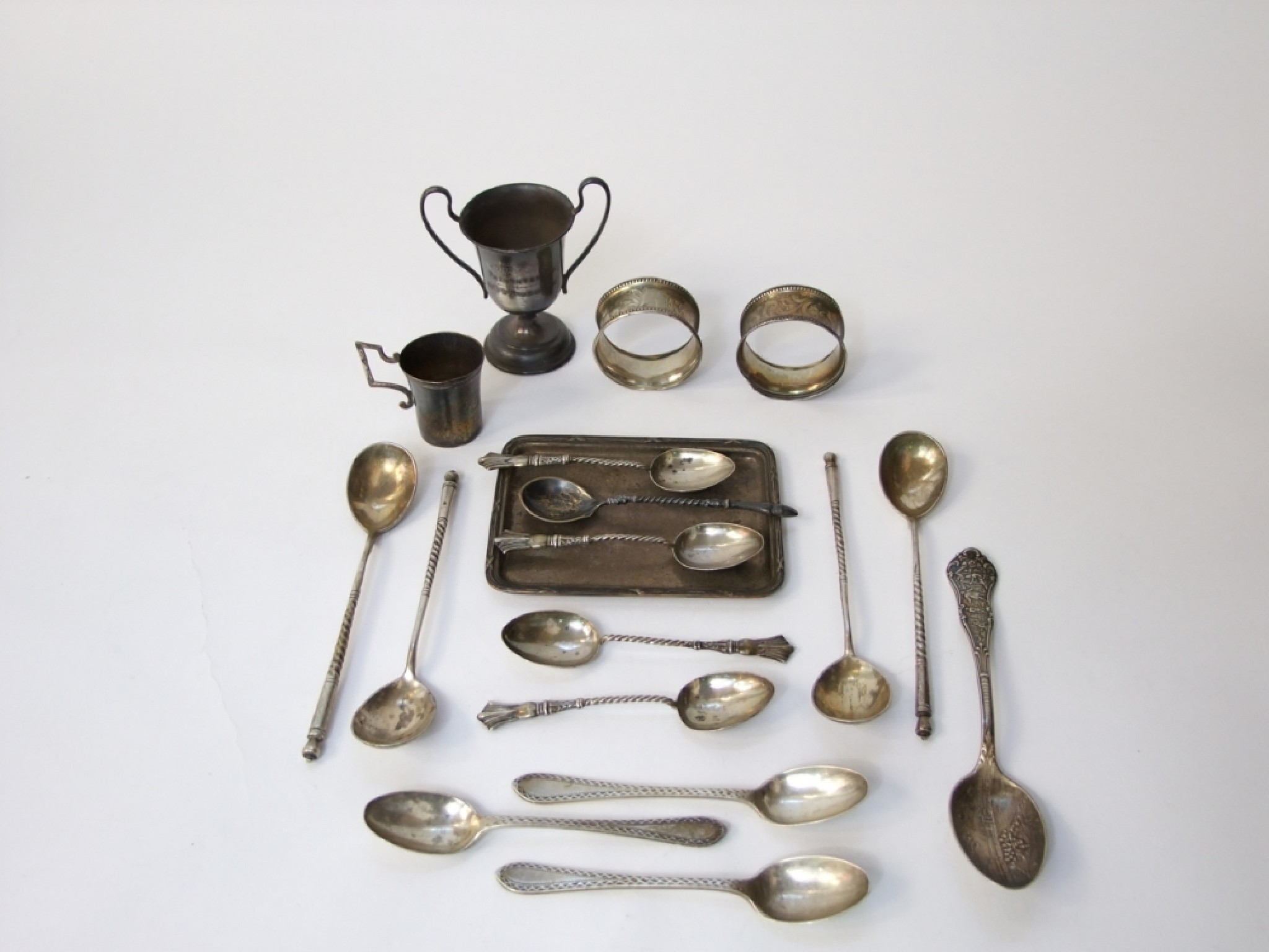 Appraisal: A collection of small odd silver teaspoons dish napkin rings