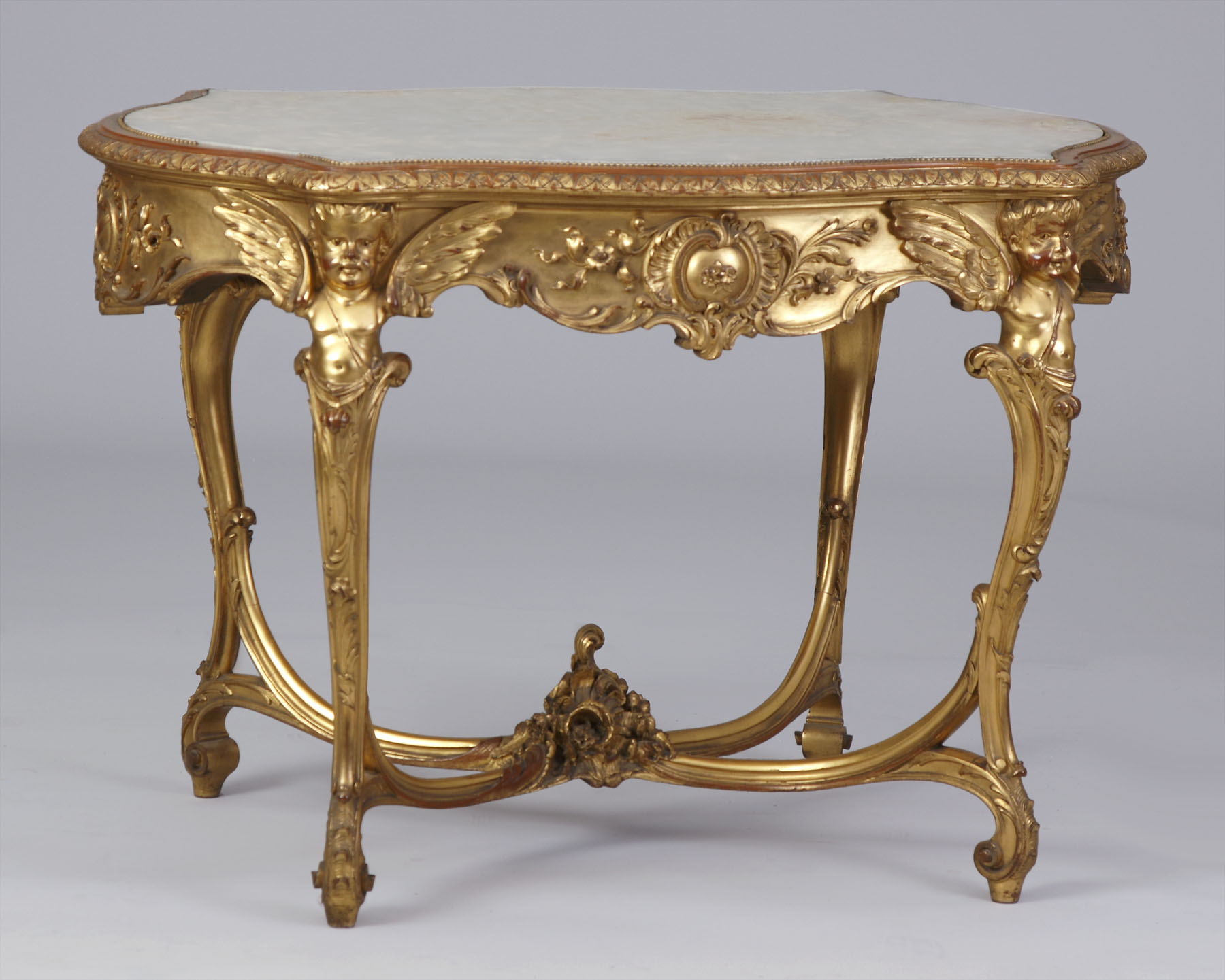 Appraisal: Louis V Style Carved Gilt Onyx Table Scalloped onyx top