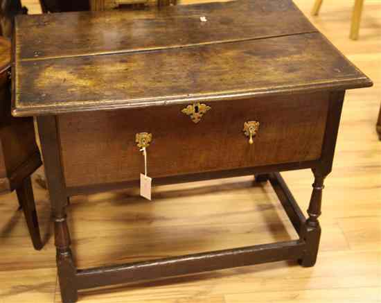 Appraisal: A late th century oak side table with deep drawer