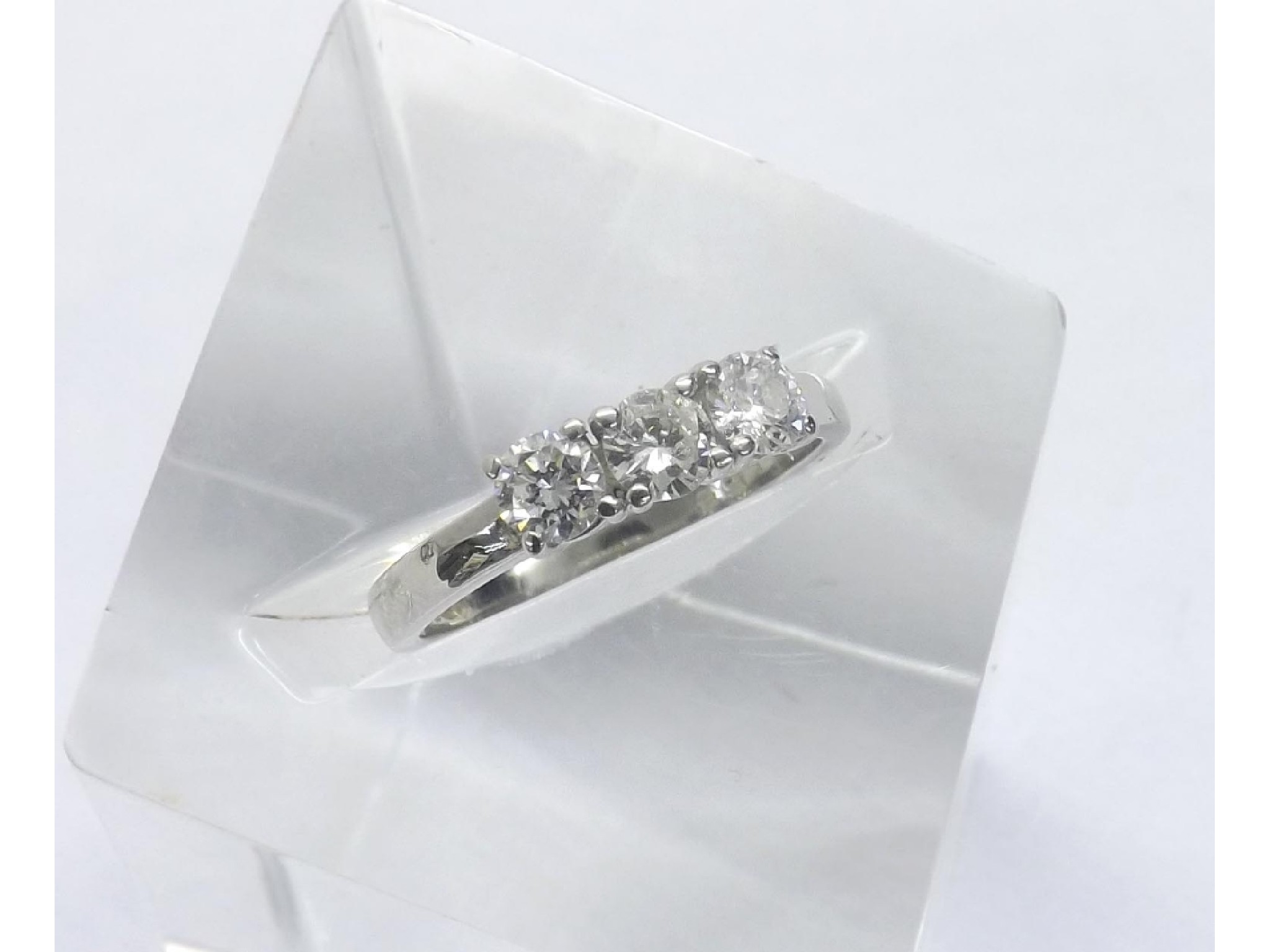 Appraisal: - -a Platinum three stone brilliant-cut diamond ring ct approx