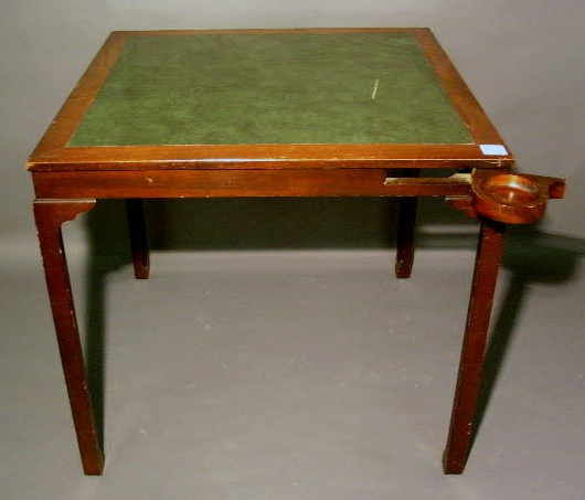 Appraisal: Mahogany bridge table by Saybolt Cleland with green leather top