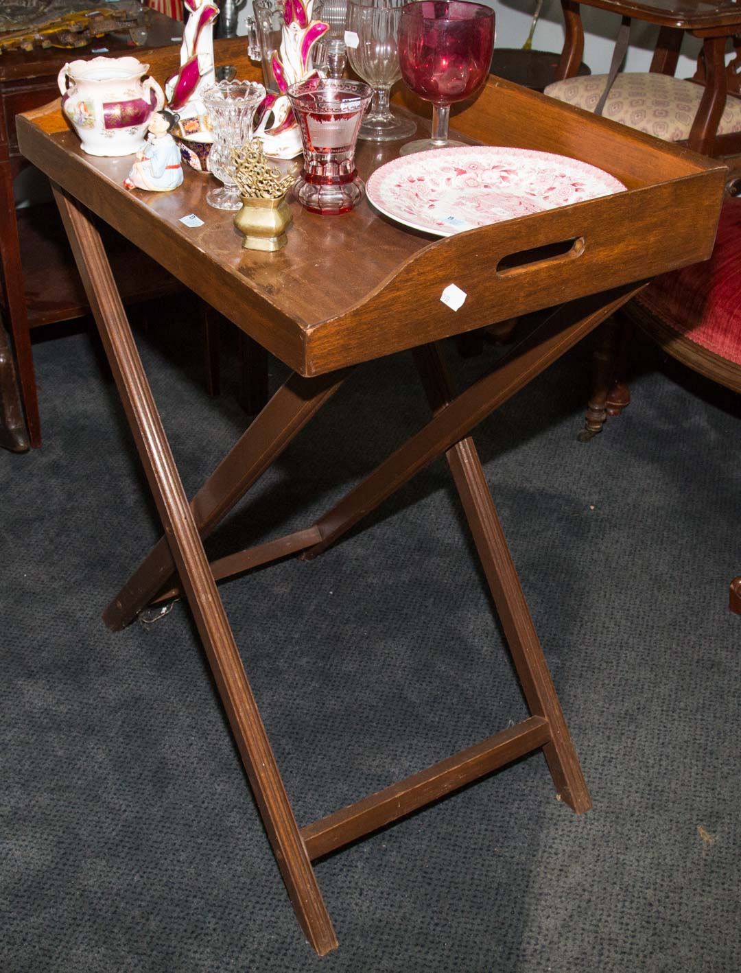 Appraisal: b Mahogany butler's tea tray on cross-fold stand