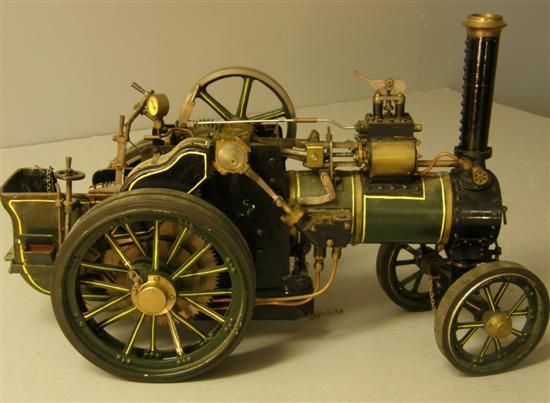 Appraisal: Working model of a steam traction engine green body highlighted