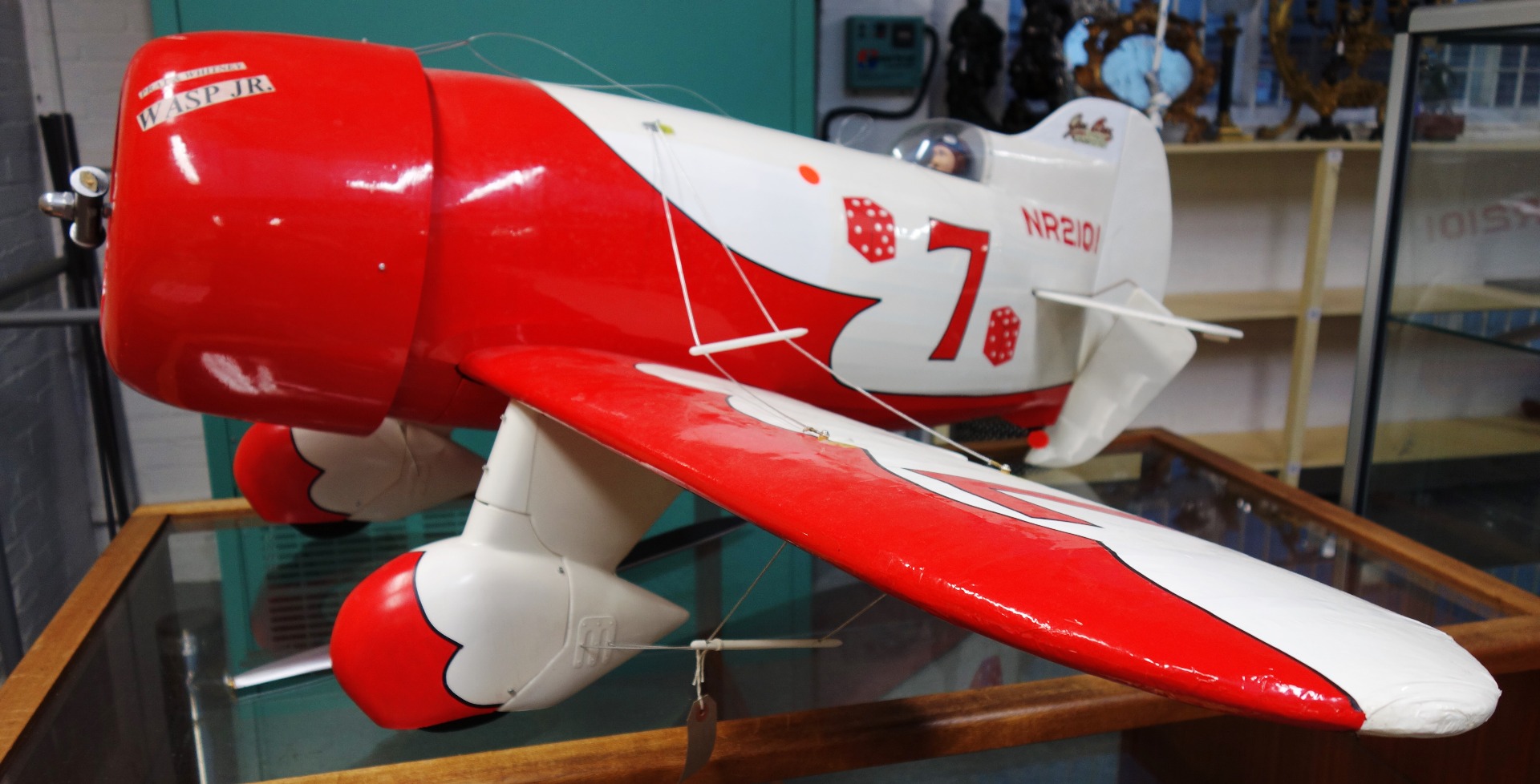 Appraisal: A model of a Gee Bee monoplane red and white