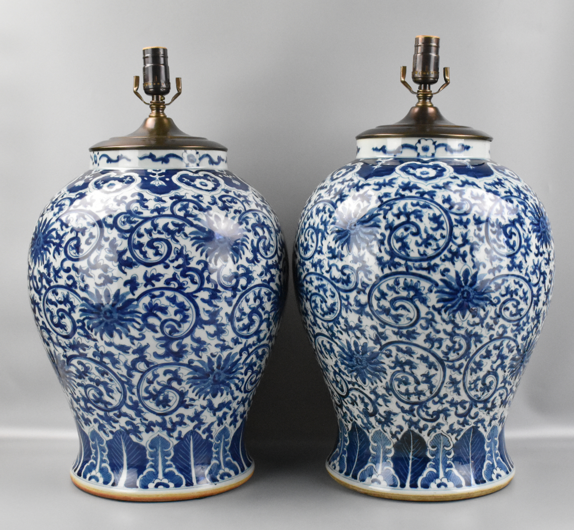 Appraisal: A pair of Chinese blue and white jars with scrolling