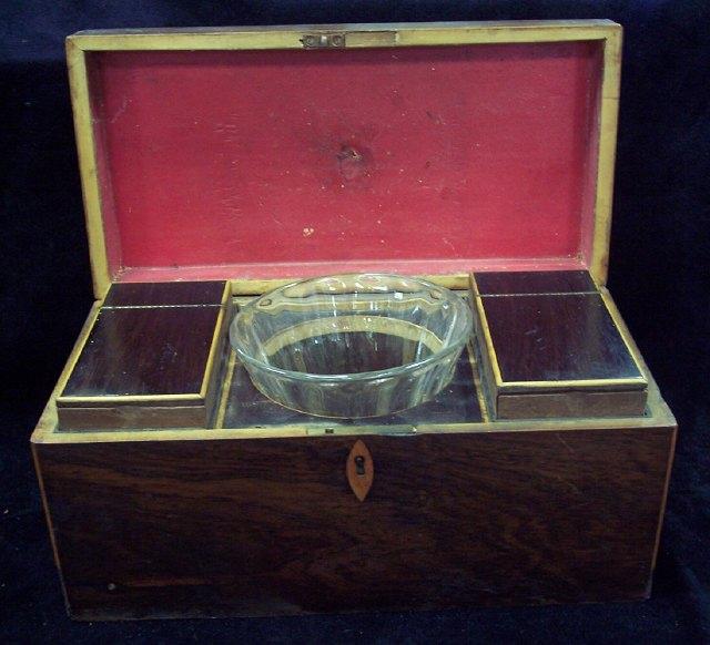 Appraisal: A th Century rosewood tea caddy the hinged lidded compartments