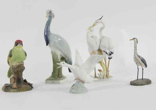 Appraisal: A Royal Crown Derby woodpecker cm high a Nymphenburg heron