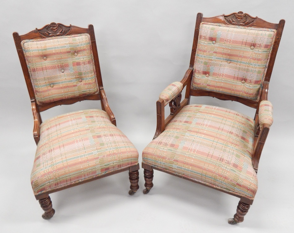 Appraisal: A pair of Edwardian walnut salon type chairs one with