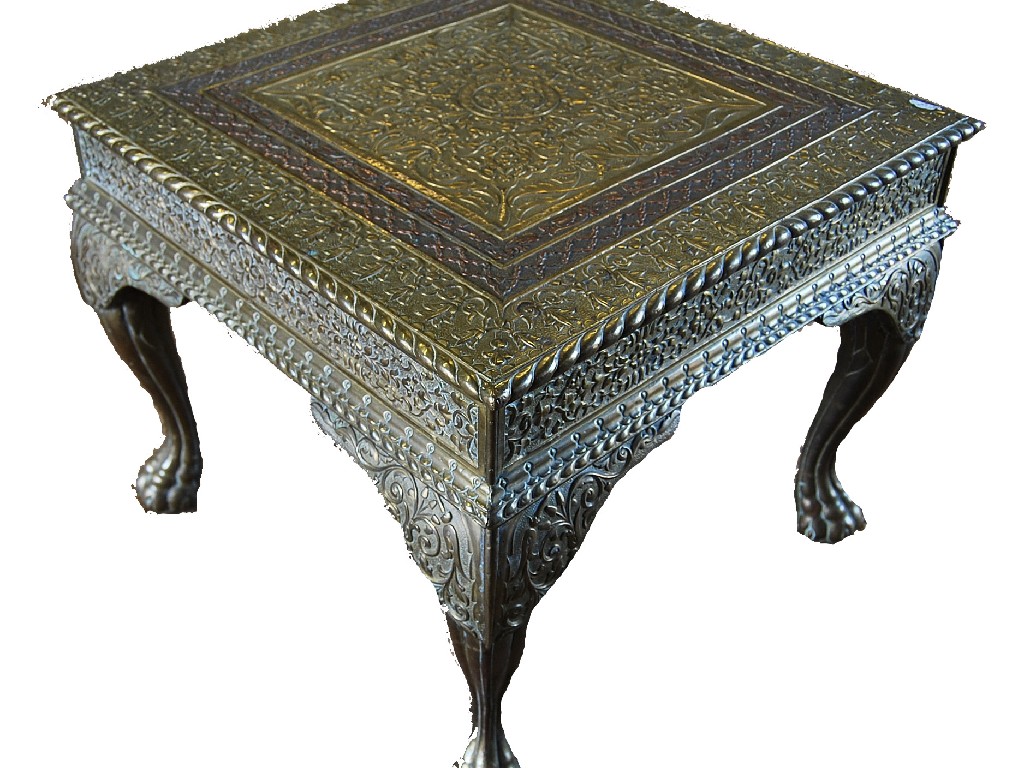 Appraisal: An Indian low table carved rosewood covered with elaborately applied