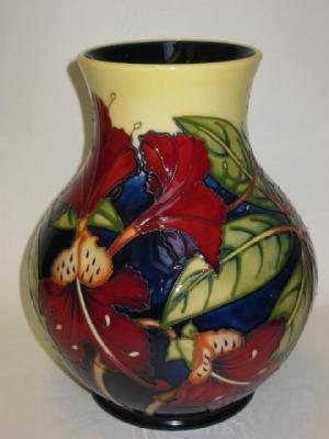 Appraisal: A MOORCROFT POTTERY VASE in the Simeon pattern designed by