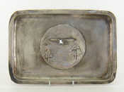 Appraisal: A silver tray with inset central cast plaque of an