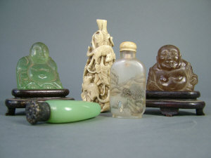 Appraisal: Two Chinese hardstone carvings of the Buddha height cm and