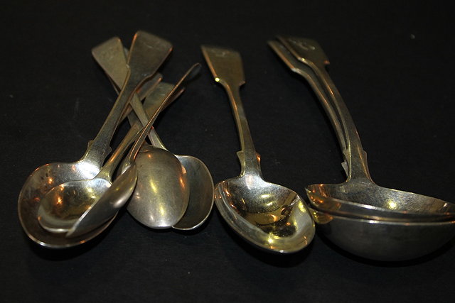 Appraisal: A PAIR OF VICTORIAN OLD ENGLISH PATTERN SILVER SAUCE LADLES