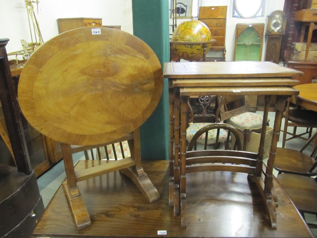 Appraisal: Mahogany nest of three leather top tables and an occasional