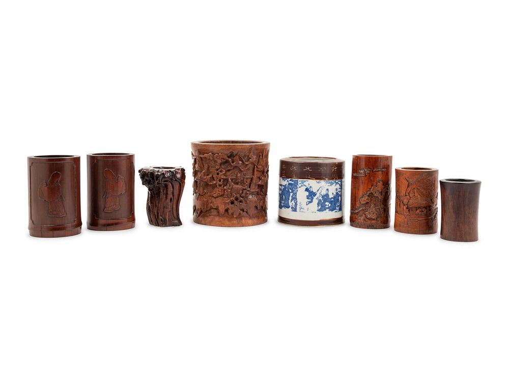 Appraisal: A Group of Chinese Hardwood and Porcelain Brush Pots A