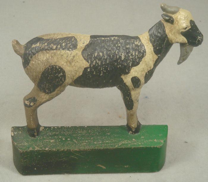 Appraisal: Cast iron doorstop tan and black Billy goat on green