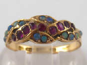 Appraisal: A carat gold opal and garnet ring hallmarked Birmingham size