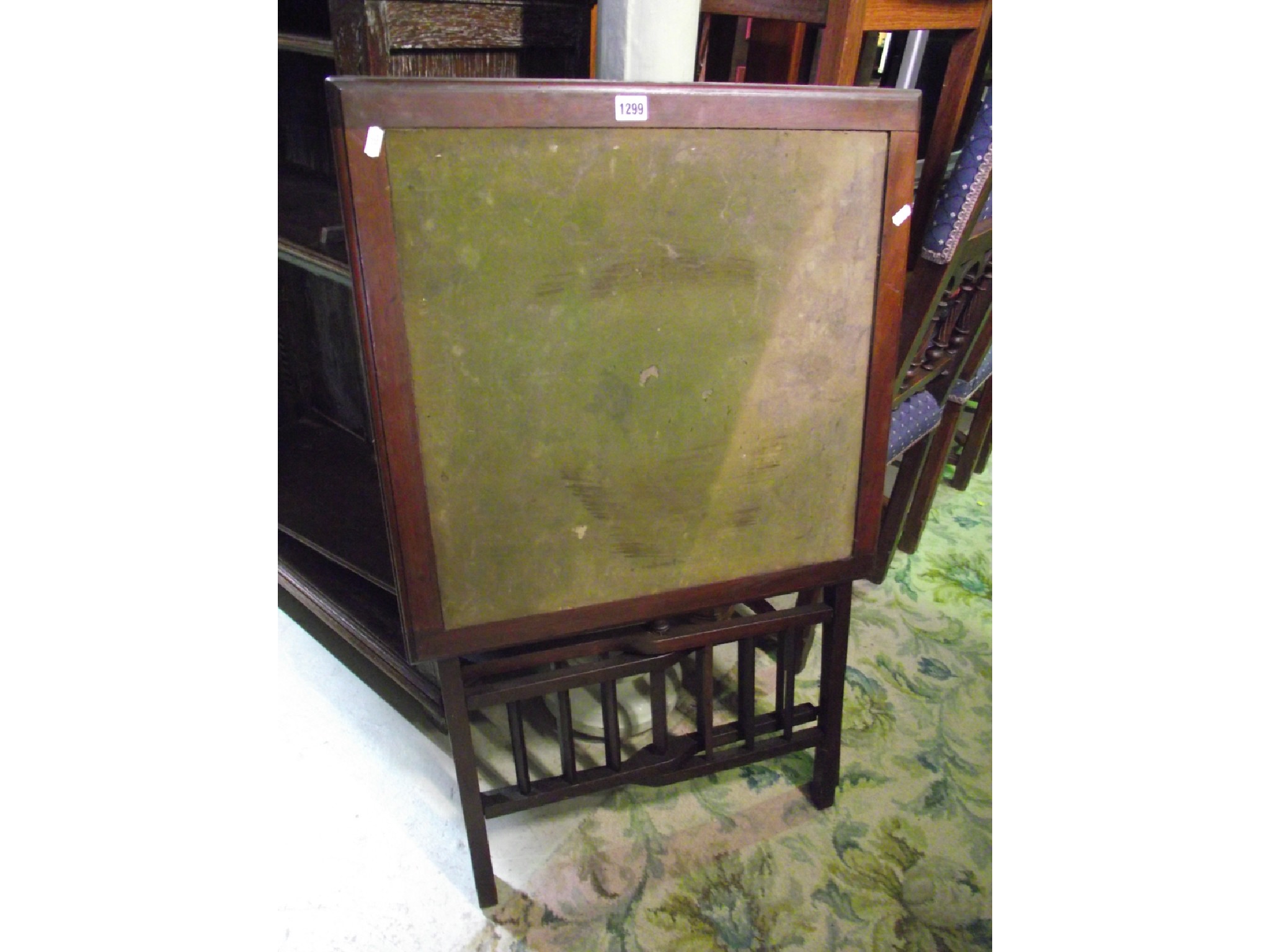 Appraisal: An Edwardian mahogany card table with folding framework and inset