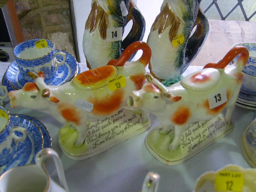 Appraisal: A pair of Royal Dux cow creamers in the form