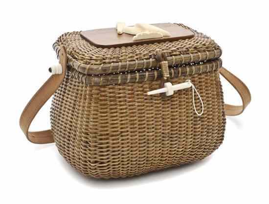 Appraisal: A Nantucket Purse Basket Farnum having a leather strap handle