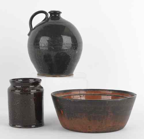 Appraisal: Three pieces of Pennsylvania redware th c to include a