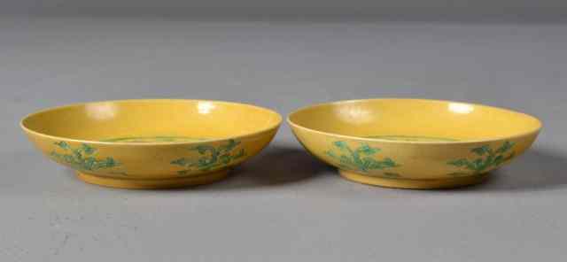 Appraisal: Pr Chinese Qing Porcelain Dragon BowlsFinely enameled on yellow ground