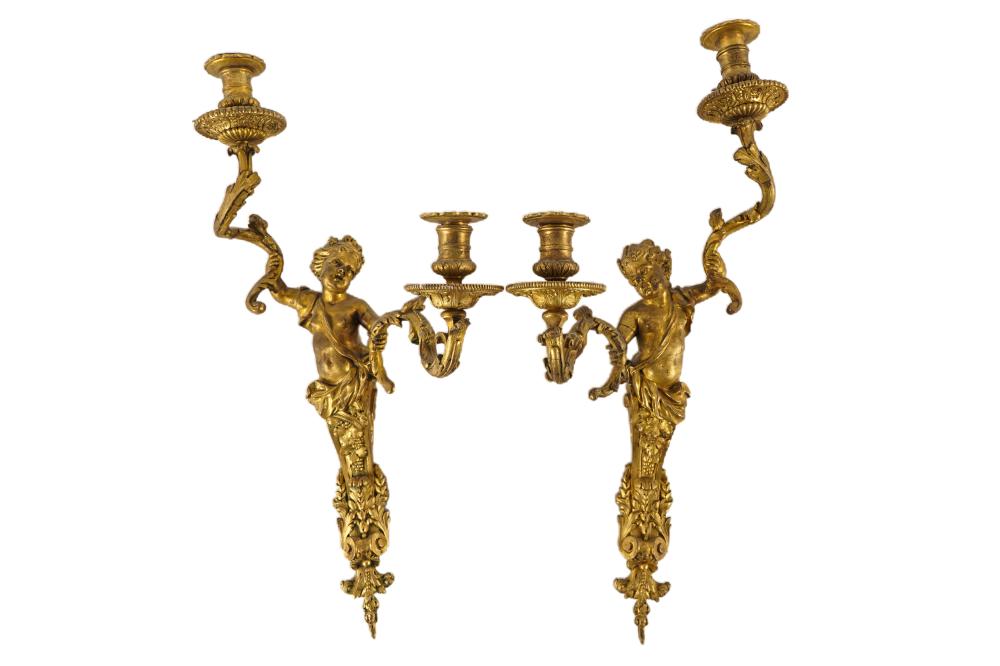 Appraisal: PAIR OF GILT BRONZE WALL SCONCESin cherub form inches high