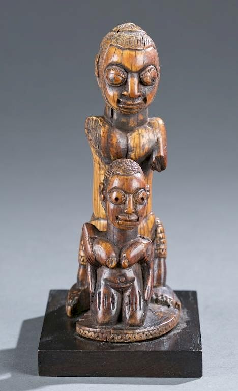 Appraisal: Owo ivory seated figure th- th century An Owo ivory