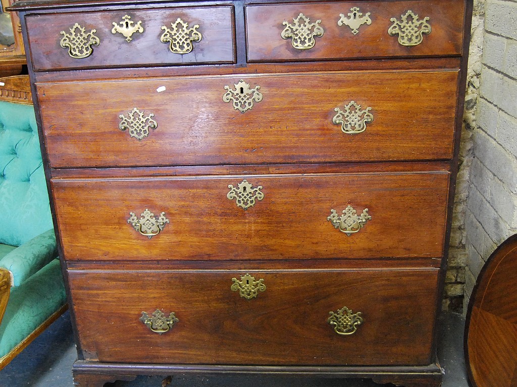 Appraisal: A large George III mahogany chest two short over three