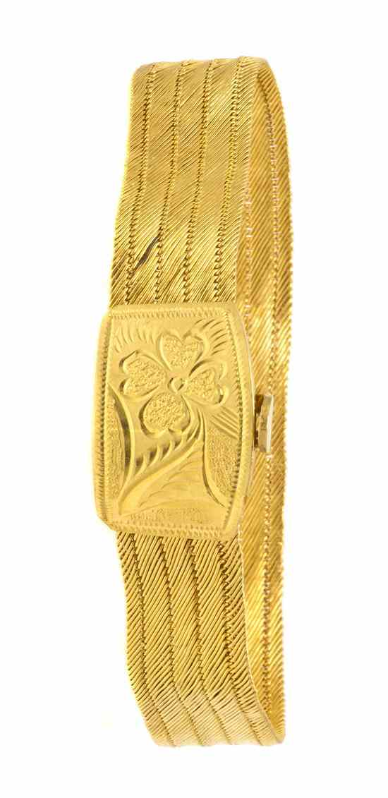 Appraisal: A Karat Yellow Gold Woven Bracelet in a textured parallel