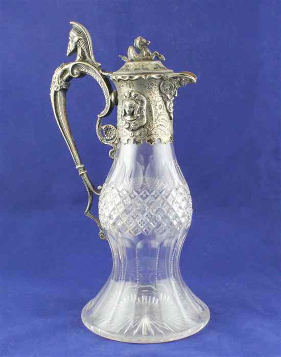 Appraisal: A late Victorian silver plated mounted cut glass claret jug