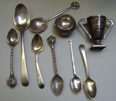 Appraisal: A Sterling circular salt five silver spoons two Philippines spoons