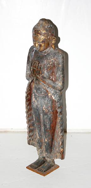 Appraisal: A Sri Lankan polychromed wood standing figure of a Buddha