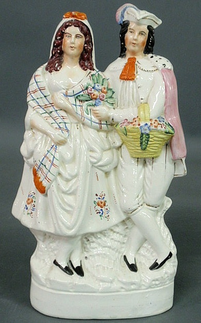 Appraisal: Staffordshire figural group of a country couple h x w