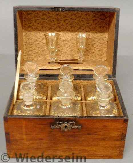 Appraisal: Mahogany cased decanter set c with six blown glass and