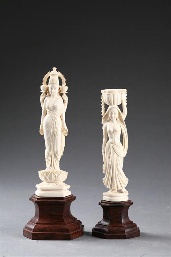 Appraisal: TWO IVORY CARVINGS India A female deity with lotus blossoms