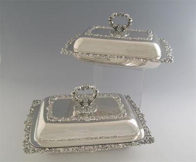 Appraisal: A pair of George III IV oblong entree dishes and