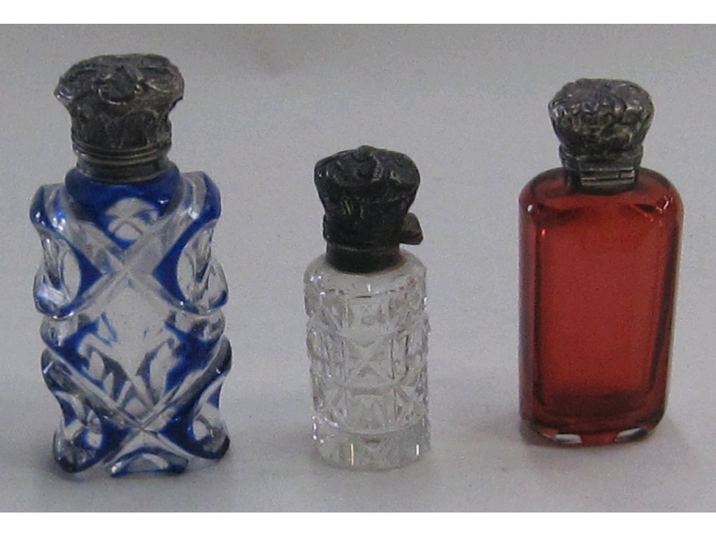 Appraisal: Lot comprising three scent bottles including a cranberry glass example