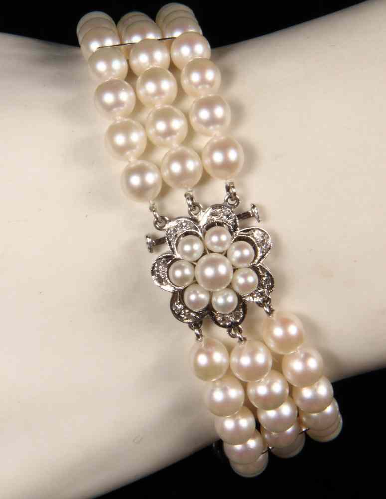 Appraisal: BRACELET - One Vintage Triple Stand of Creamy Pink Pearls